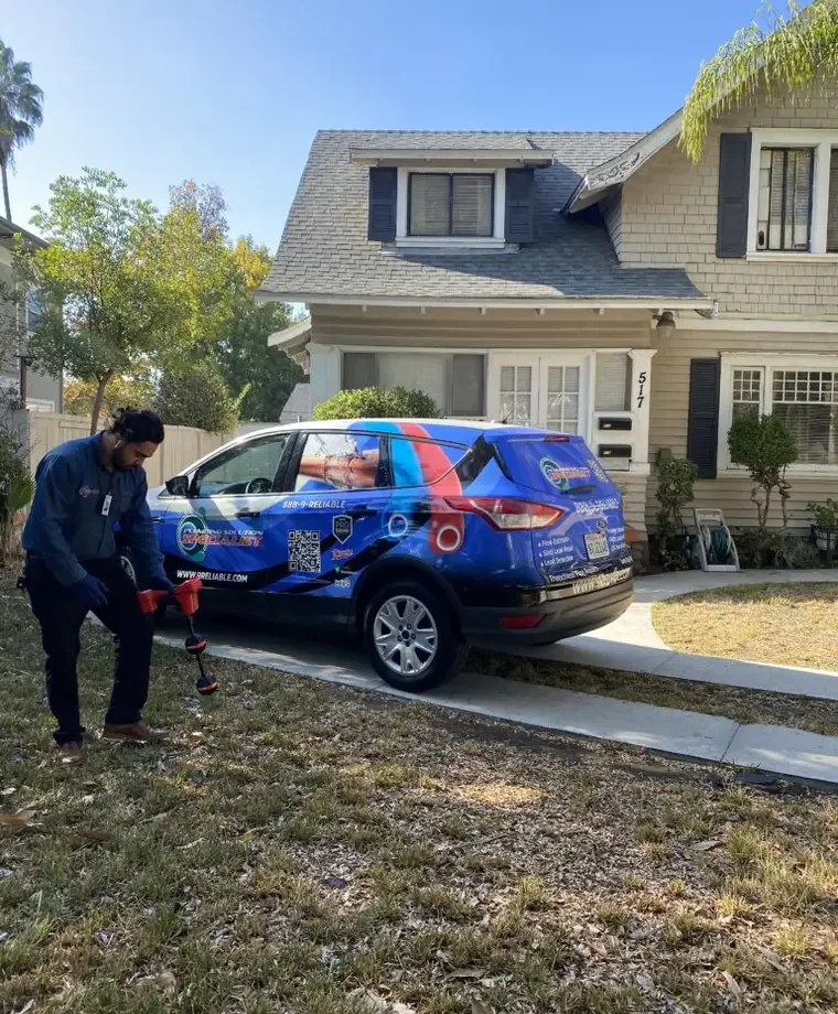 Plumbing Solution Specialist technician responding to a suspected outdoor water line leak
